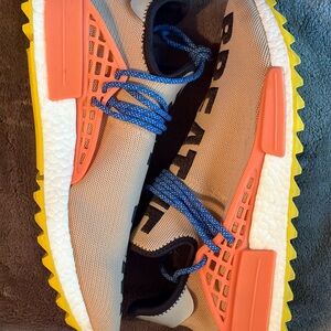 Adidas x Pharrell NMD Orange and Yellow Sneakers with Sporty Design
